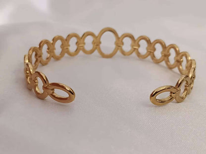 Opengewerkte armband van roestvrij staal, verguld met 18K PVD-goud