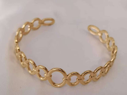 Opengewerkte armband van roestvrij staal, verguld met 18K PVD-goud