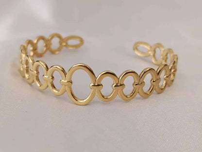 Opengewerkte armband van roestvrij staal, verguld met 18K PVD-goud