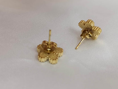 Set van bloem zirkonia armband en gouden stalen oorbellen: Solo una pulsera